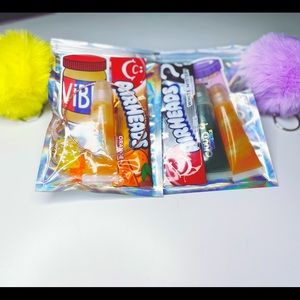 lipgloss bundle with bang-lets, pom Pom keychains